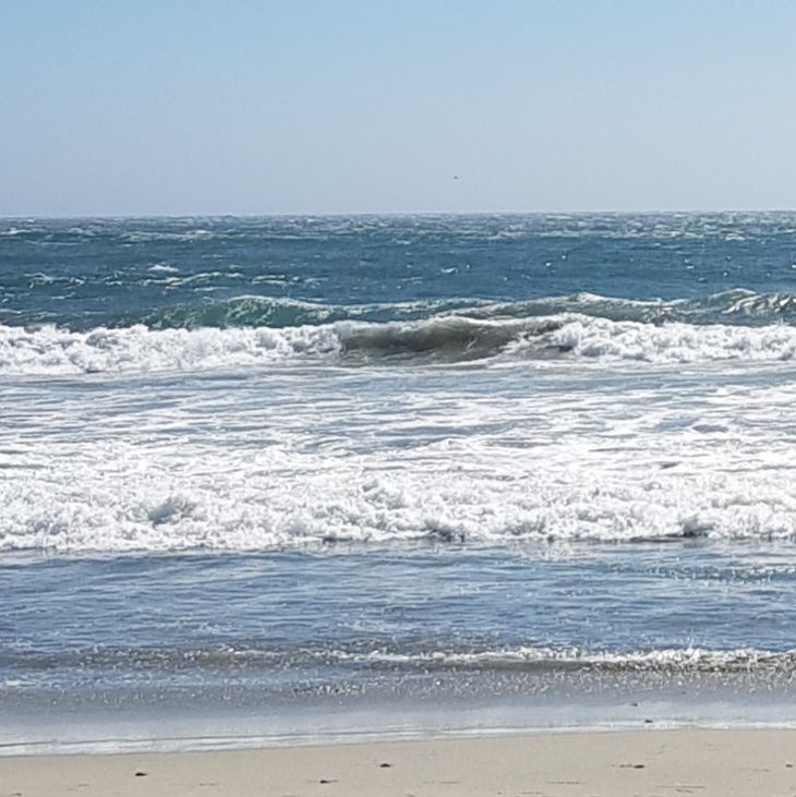 Brandung am Sandstrand.